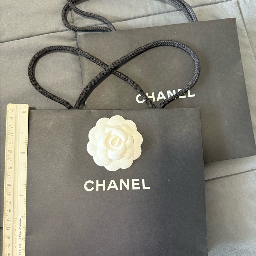 Chanel Black Luxury Shopping Bag with Iconic Camellia